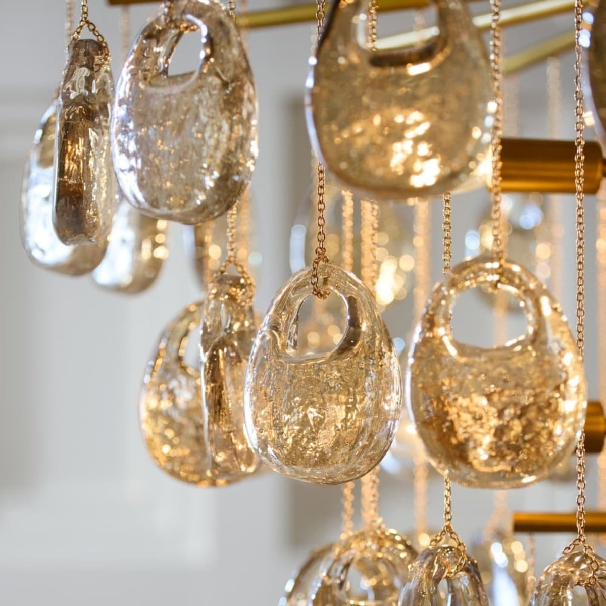 Velaian lampadario Gocce in vetro ambra ottone Antico