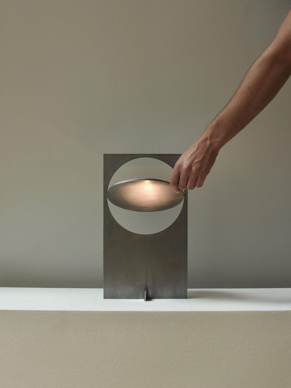 Terieriella lampada da tavolo con disco rotante