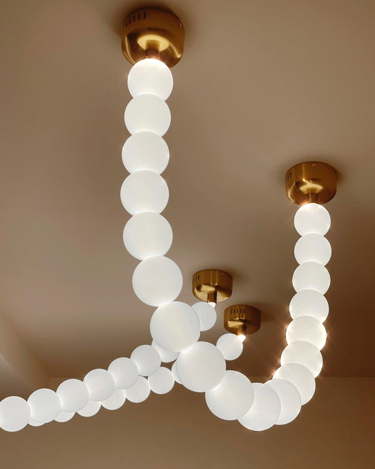 Kanell lampadario in ottone Sputnik