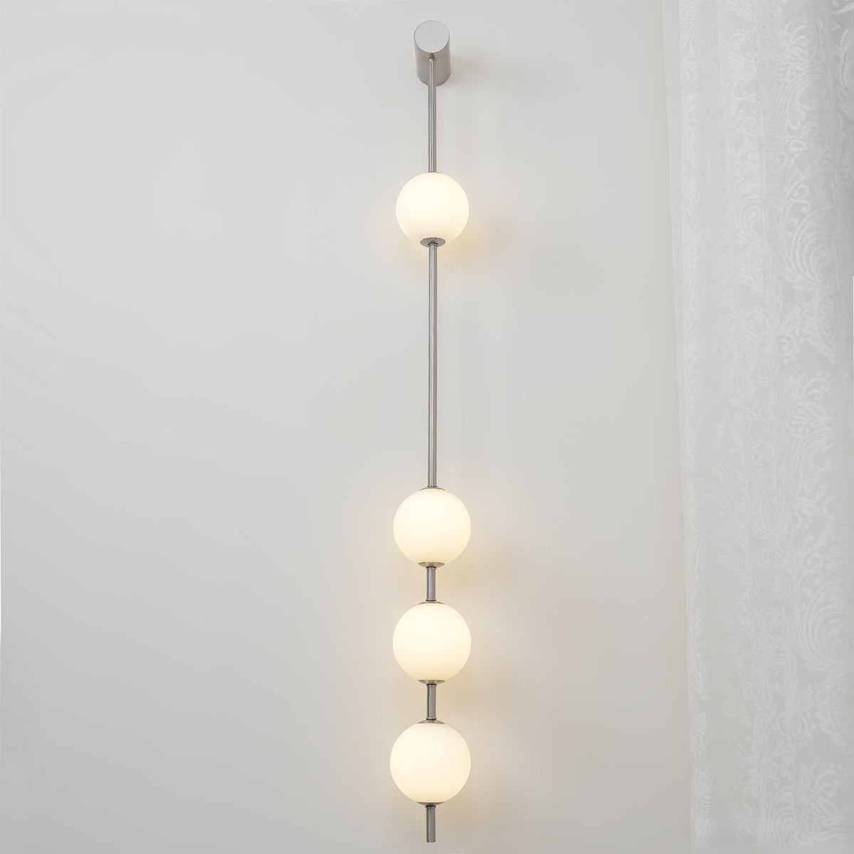 Soloiella lampada da parete Verticali Sferiche ottone a globo