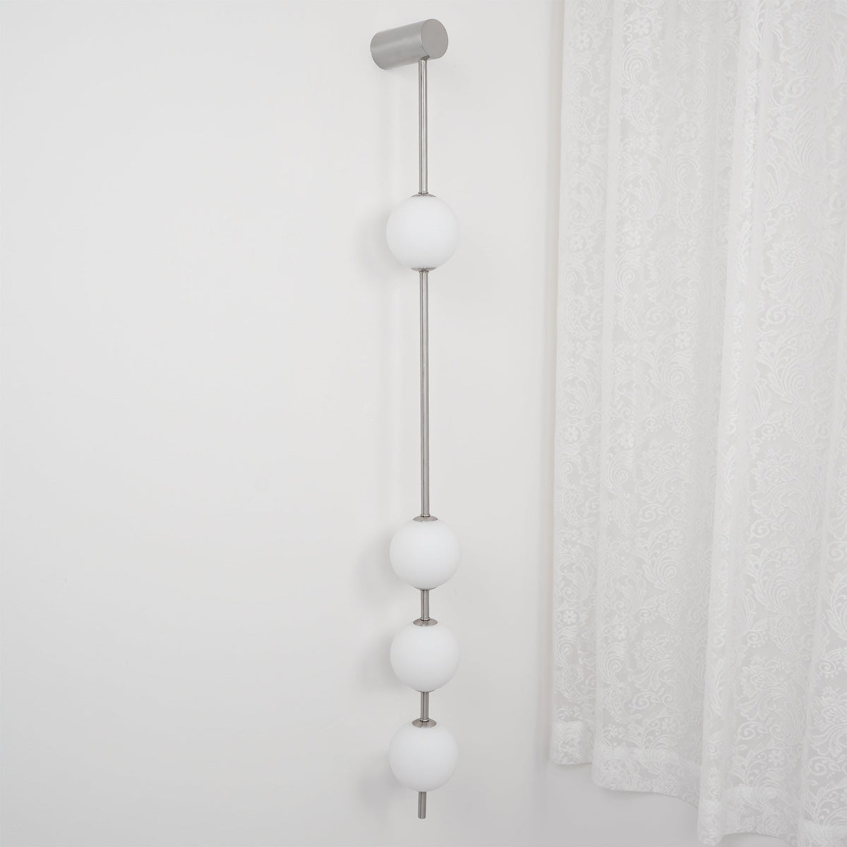 Soloiella lampada da parete Verticali Sferiche ottone a globo