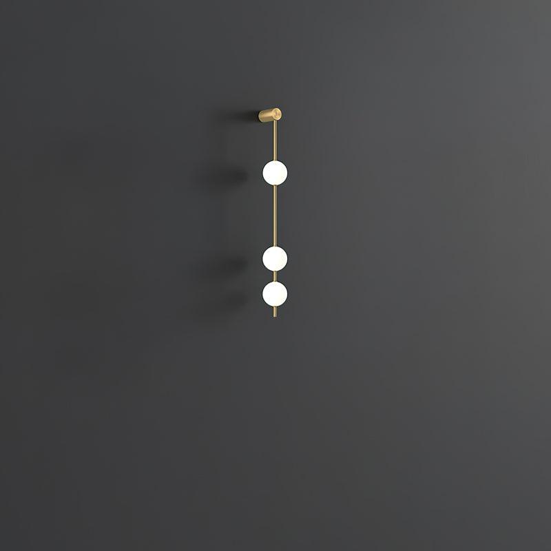 Soloiella lampada da parete Verticali Sferiche ottone a globo