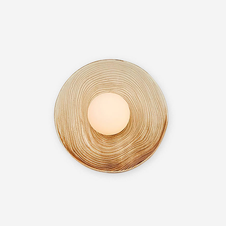 Lampada da parete in ceramica testurizzata con disco e dettagli in legno per ingresso moderno