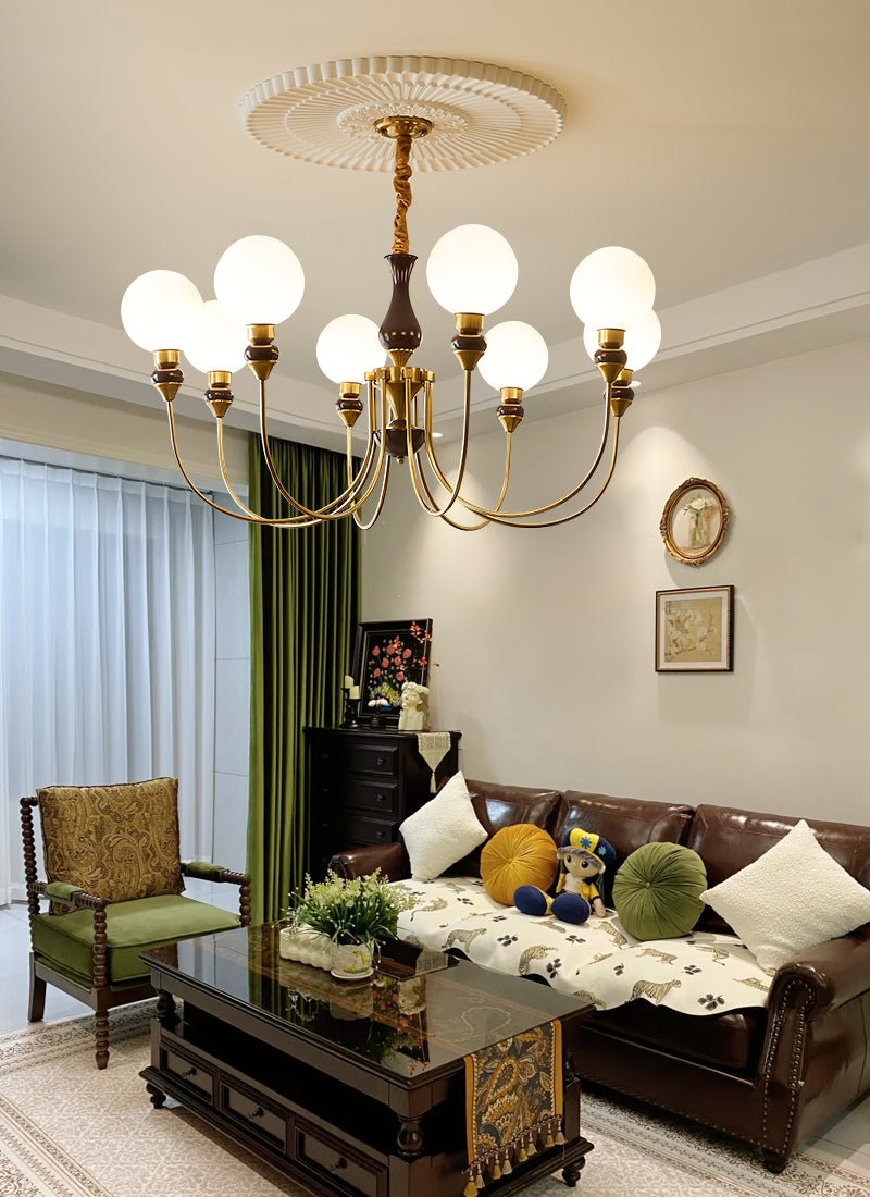 Eiruella lampadario Bracci in ottone globi in vetro Smerigliato