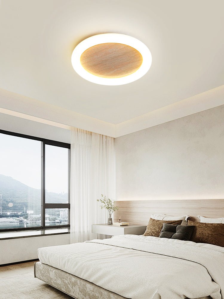 Kaia lampada da soffitto minimalista in travertino giallo con effetto alone