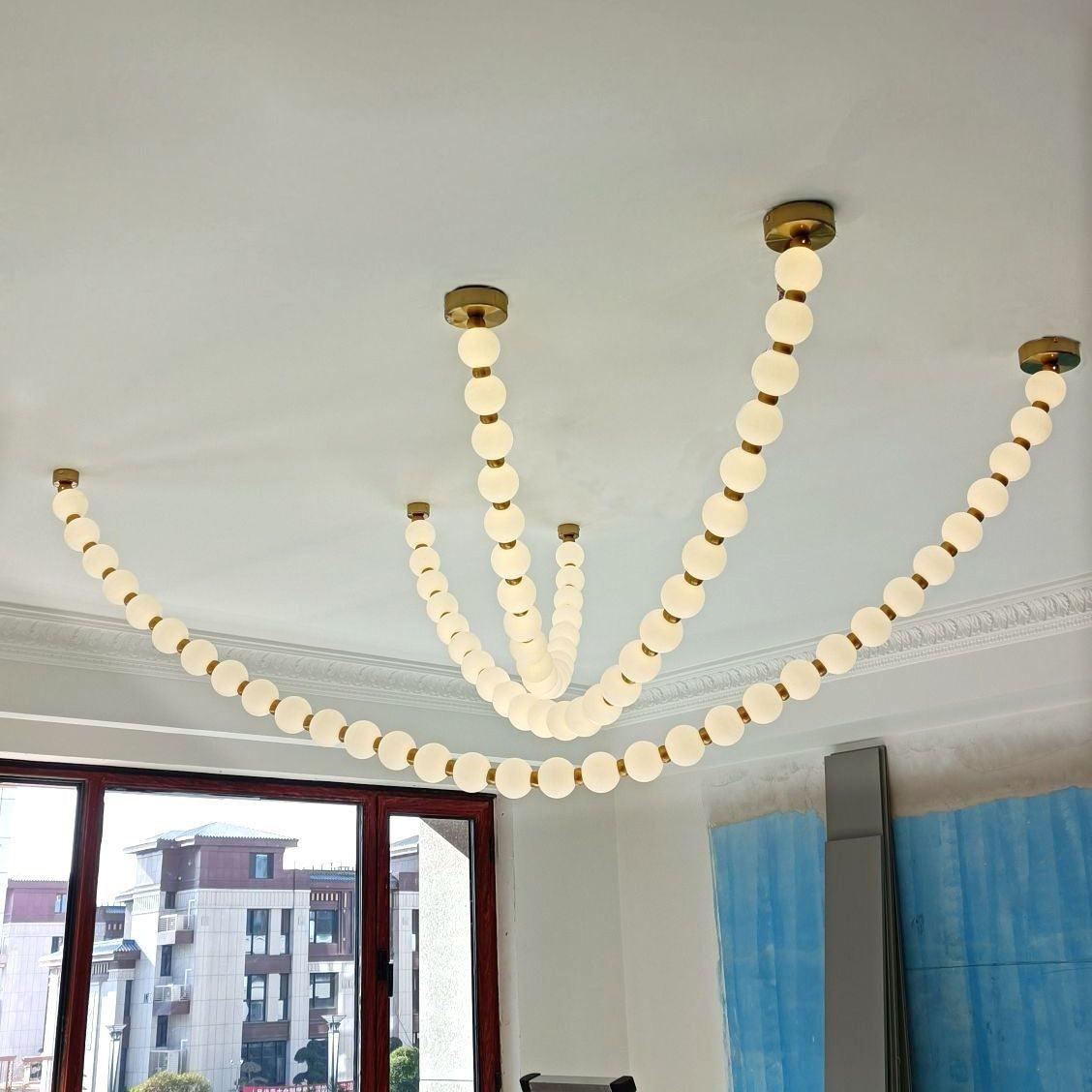Kanell lampadario in ottone Sputnik