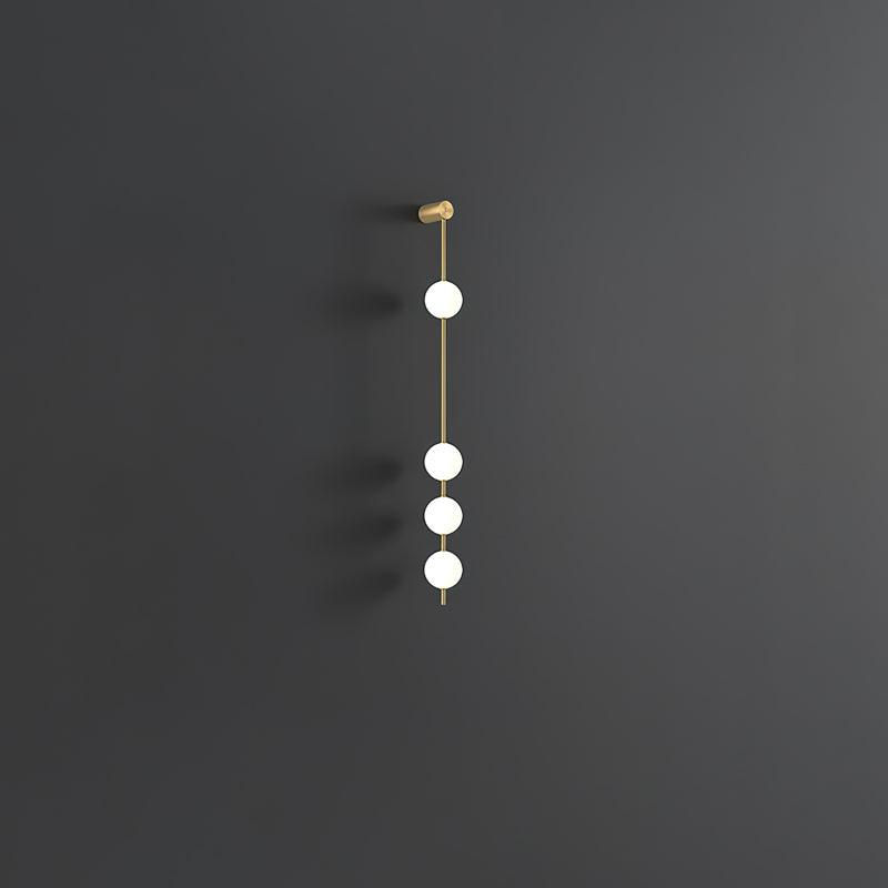 Soloiella lampada da parete Verticali Sferiche ottone a globo